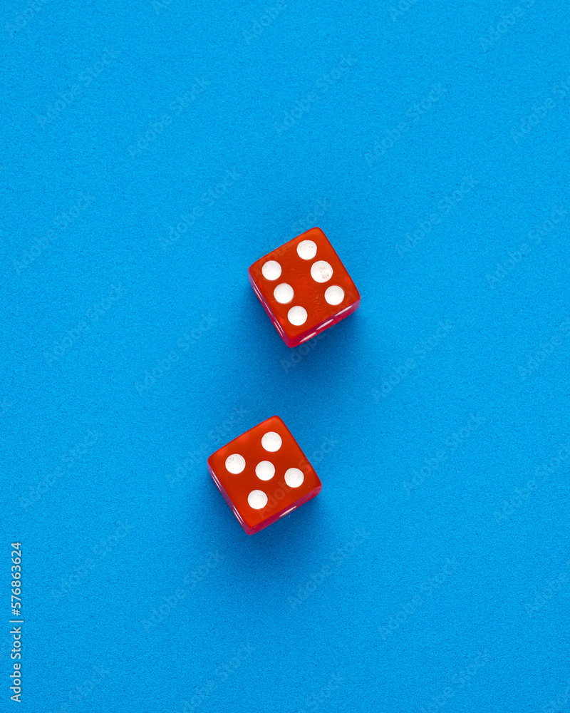 Dice for board game on blue background - Entertainment in casino Dice for board game on blue background - Entertainment in casino