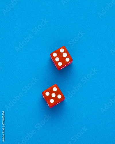 Dice for board game on blue background - Entertainment in casino