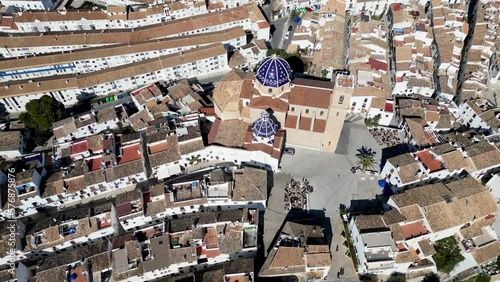 Aerial bird's-eye view of the Church of Our Lady of Solace and an old building in Altea, Spain. photo