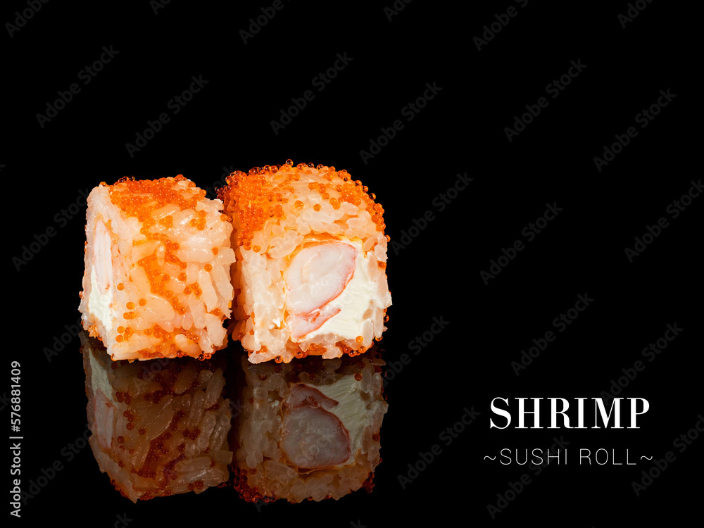 Side view of sushi roll pieces with mirror reflection on black background. Sushi roll with cream cheese, Ebi shrimp and flying fish roe on top. Ready menu advertising banner with text and copy space Side view of sushi roll pieces with mirror reflection on black background. Sushi roll with cream cheese, Ebi shrimp and flying fish roe on top. Ready menu advertising banner with text and copy space
