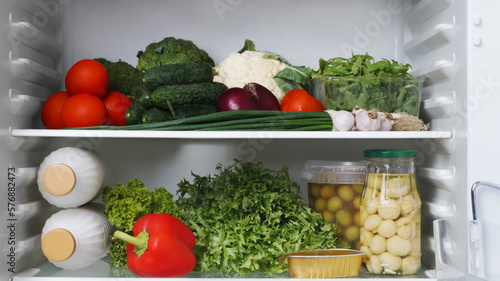 Many different healthy products on refrigerator shelves