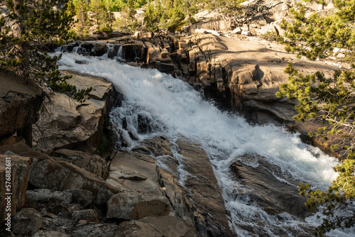 Tuolomne River Rushes Over Steps Of Granite In Yosemite photo