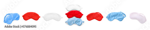 Set of soft sleep masks on white background, top view