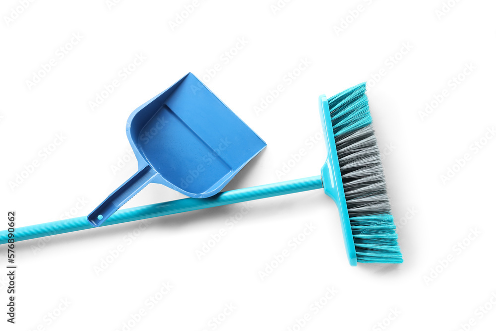 Blue dustpan and broom on white background Stock Photo | Adobe Stock