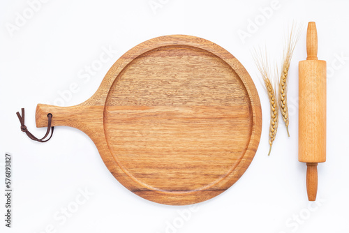 Empty wooden pizza platter set up on isolated on white background. Pizza tray on  on white background flat lay and copy space...