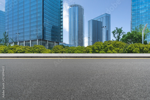 Photography cityscape and skyline of shanghai from empty asphalt road.