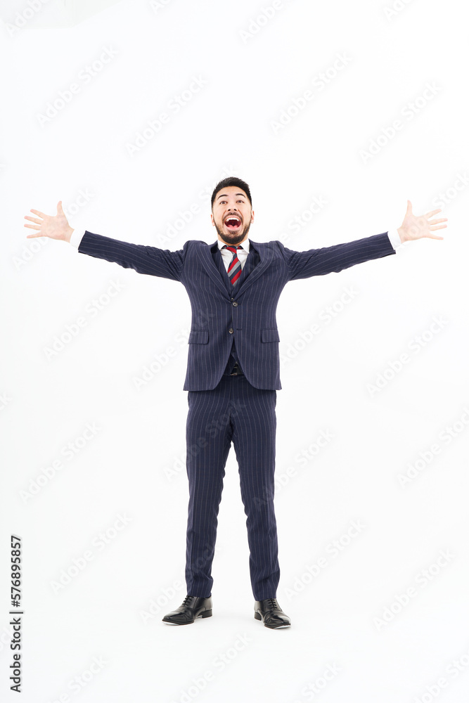 A man in a suit expressing joy A man in a suit expressing joy