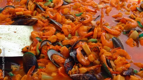 A cook is preparing sea food for daily meal at Punta Cana region in Dominican Republic.