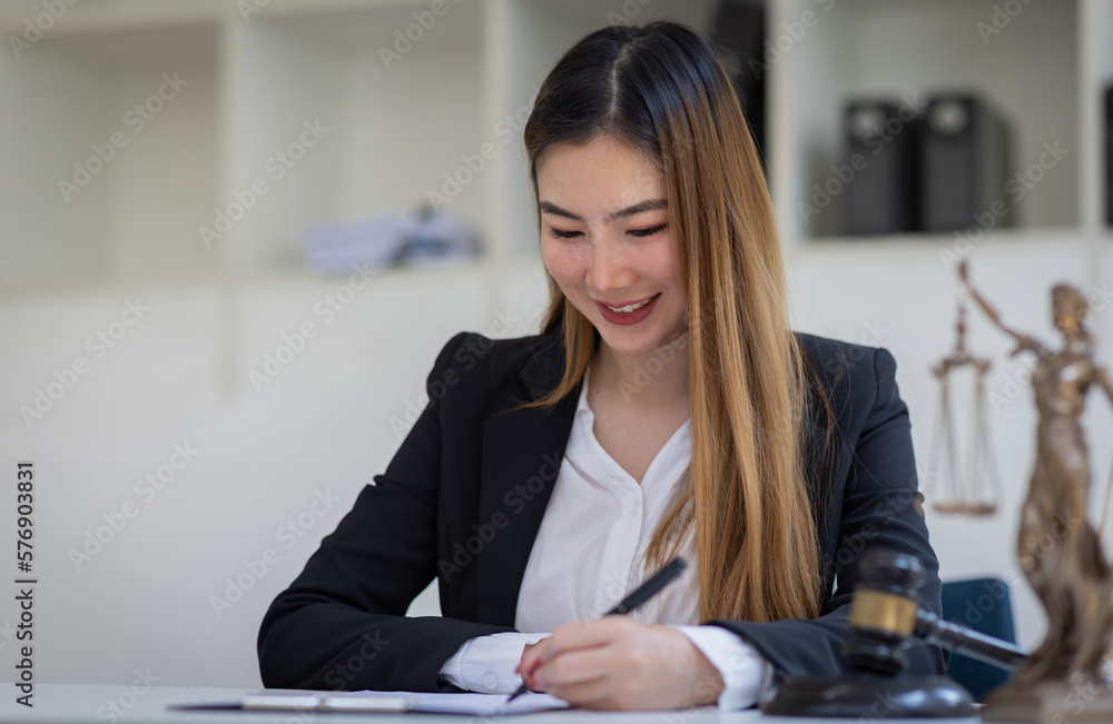 female intelligent law attorney lawyers working at the law firms. Judge gavel with scales of justice. defense lawyer for justice at the office, Legal law, lawyer, advice and justice concept. female intelligent law attorney lawyers working at the law firms. Judge gavel with scales of justice. defense lawyer for justice at the office, Legal law, lawyer, advice and justice concept.
