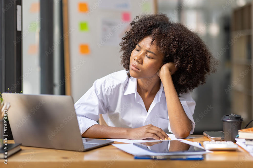 Portrait of tired young business african american woman work with documents tax laptop computer in office. Sad, unhappy, Worried, Depression, or employee life stress concept
Portrait of tired young business african american woman work with documents tax laptop computer in office. Sad, unhappy, Worried, Depression, or employee life stress concept
