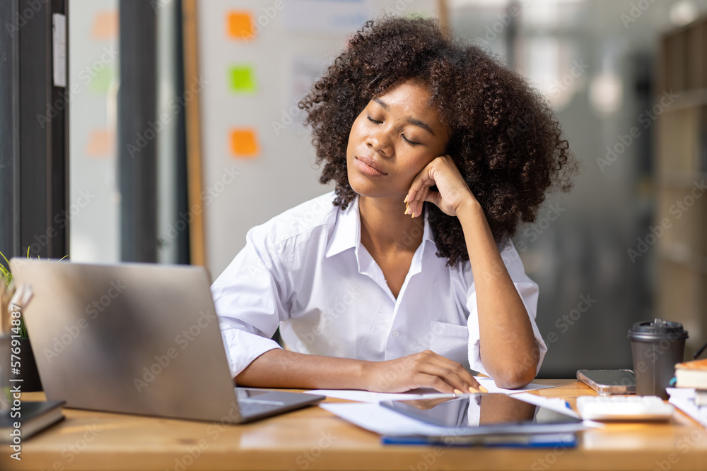 Portrait of tired young business african american woman work with documents tax laptop computer in office. Sad, unhappy, Worried, Depression, or employee life stress concept
Portrait of tired young business african american woman work with documents tax laptop computer in office. Sad, unhappy, Worried, Depression, or employee life stress concept