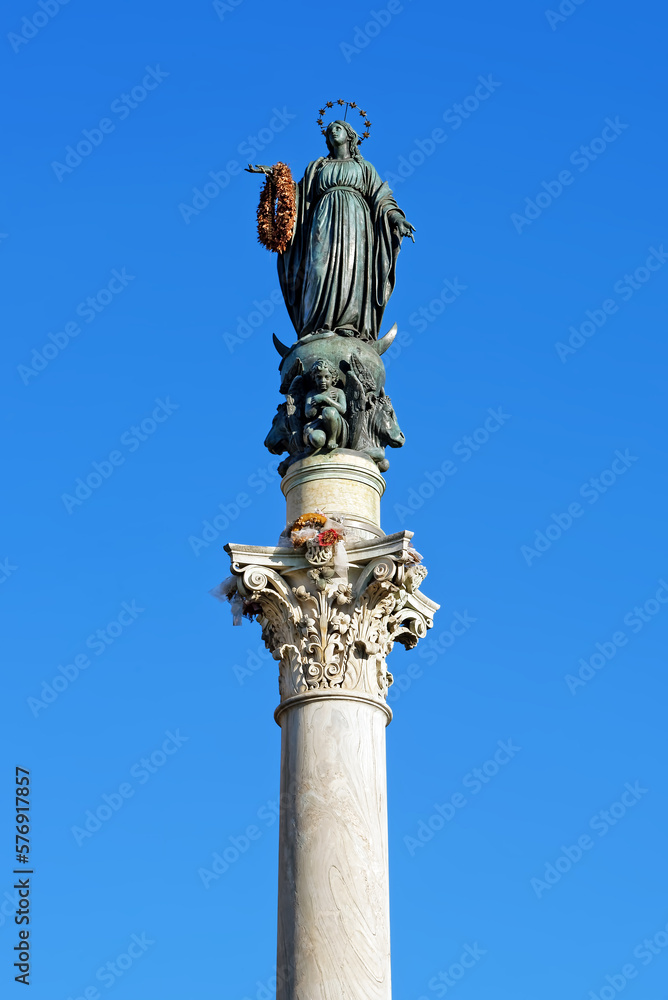 The Column of the Blessed Virgin Mary as the Immaculate Conception in Rome, Italy. It is a 19th century monument carrying a wreath of flowers offered annually by the Roman firemen.