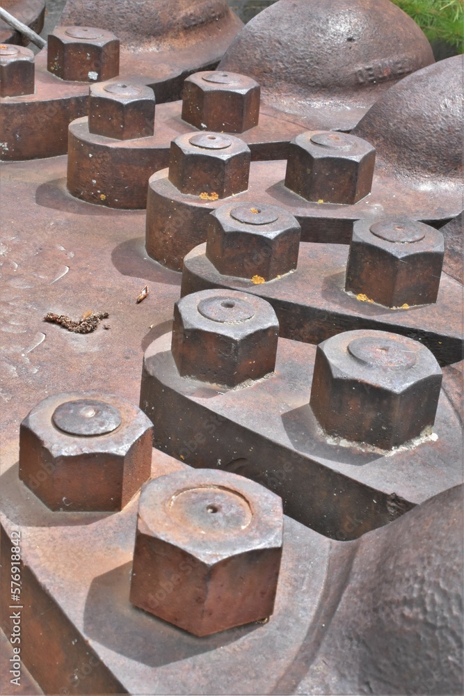 Close up of rusted bolts on an old electrical generating station. Close up of rusted bolts on an old electrical generating station.