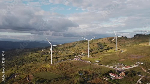 view of the mountains with windmills photo