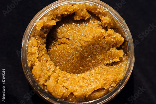 Obraz na plátně Macro texture of sugar scrub with crystals in a round jar