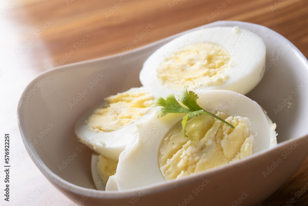 Closeup of boiled egg in bowl Closeup of boiled egg in bowl