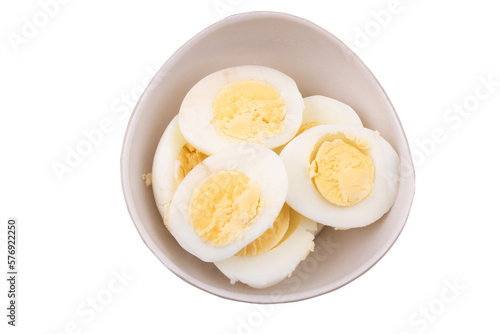 Sliced boil egg in bowl isolated on white background with clipping path