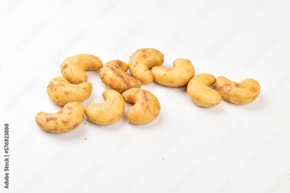 Spicy roasted cashew on white background Spicy roasted cashew on white background
