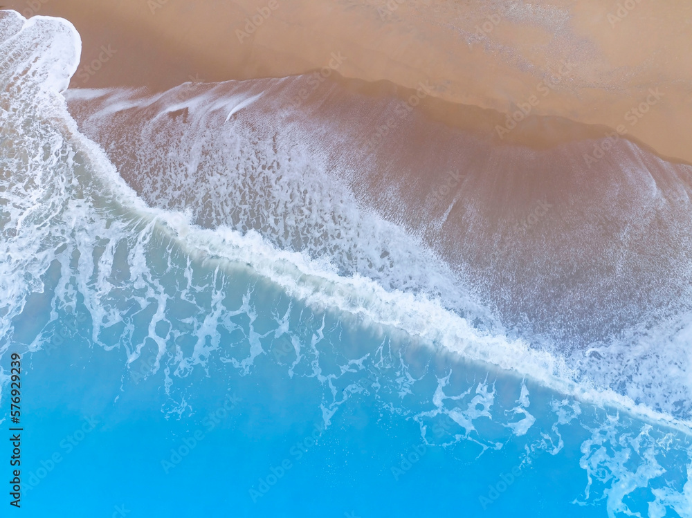 The tropical Summer with  Soft blue ocean wave on fine sandy beach  background