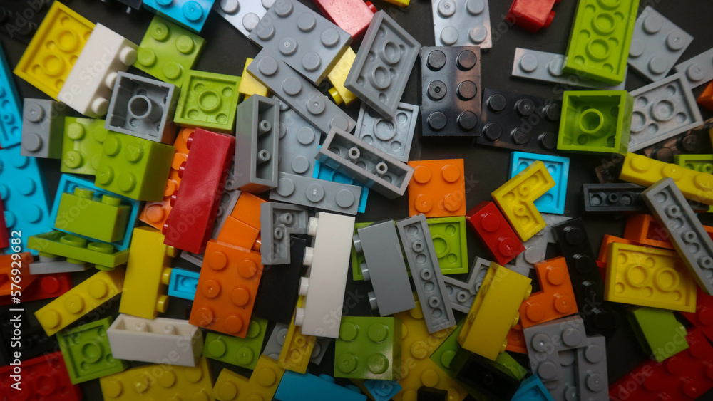 Plastic toy block on a black background Plastic toy block on a black background