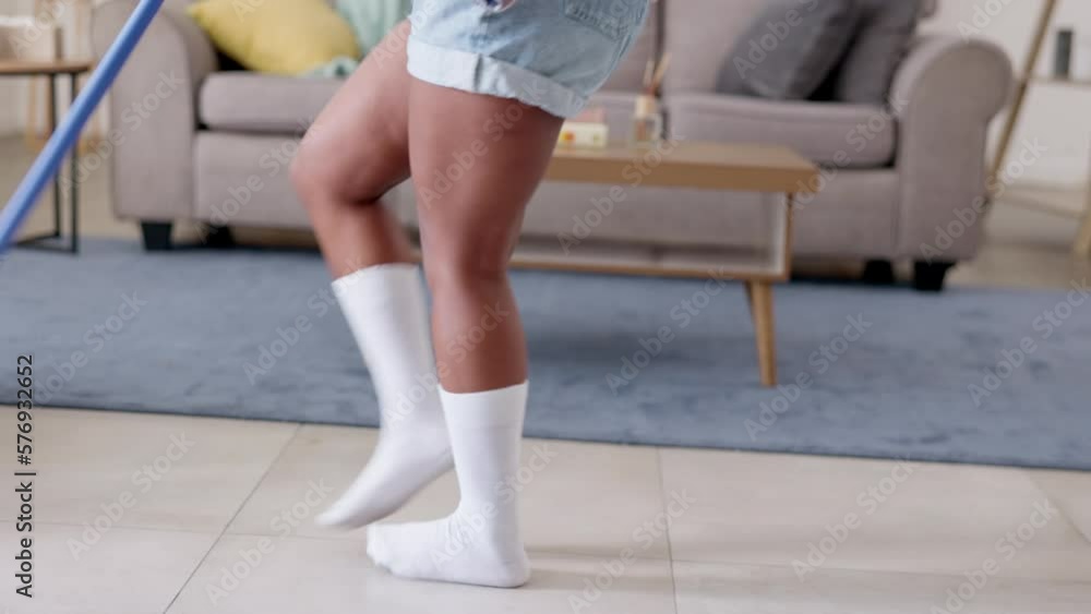 Legs, dancing or cleaner cleaning and listening to dance music on