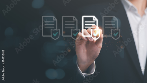 Businessman checking the steps through a virtual online document with a list of checkboxes Concepts of practices and policies, company articles of association Terms and Conditions ,check correctness