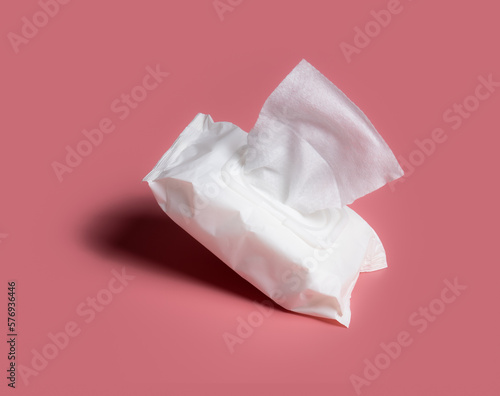Cuadro en lienzo Open wet wipes flow pack on pink background,flat lay