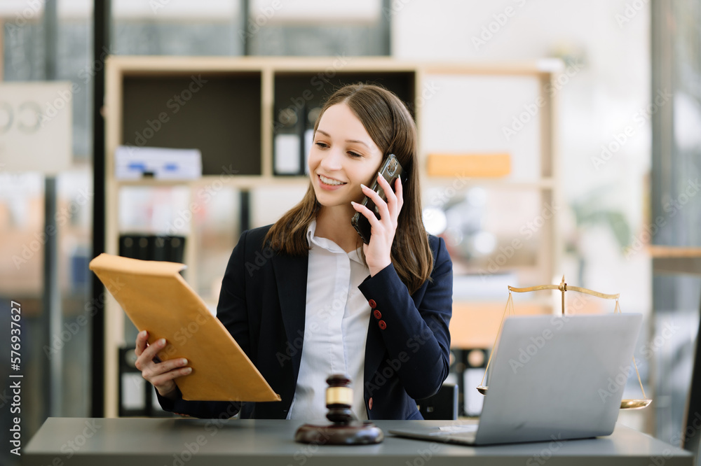 Woman lawyer working and gavel, tablet, laptop in front, Advice justice and law concept.. Woman lawyer working and gavel, tablet, laptop in front, Advice justice and law concept..