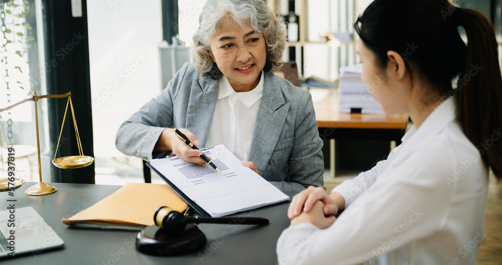 Business and Male lawyer or judge consult having team meeting with client, Law and Legal services concept.Customer service good cooperation Business and Male lawyer or judge consult having team meeting with client, Law and Legal services concept.Customer service good cooperation