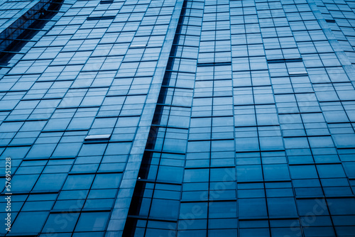 Urban abstract - windowed corner of office building.