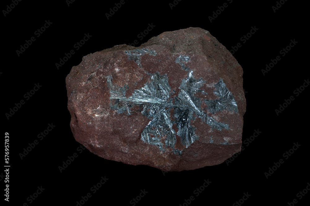 Antimony almost always contains some arsenic, but may also contain traces of silver, iron, and sulfur. Isolated in black background.