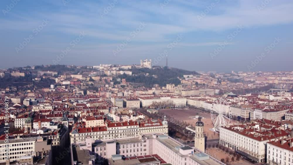 Drone flying over old Lyon cityscape towards Fourviere Notre Dame hill viewpoint on a sunny day Drone flying over old Lyon cityscape towards Fourviere Notre Dame hill viewpoint on a sunny day