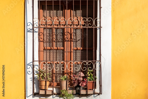 Vintage window of an old Portuguese era house in the Fontainhas district of the city of Panaji. photo