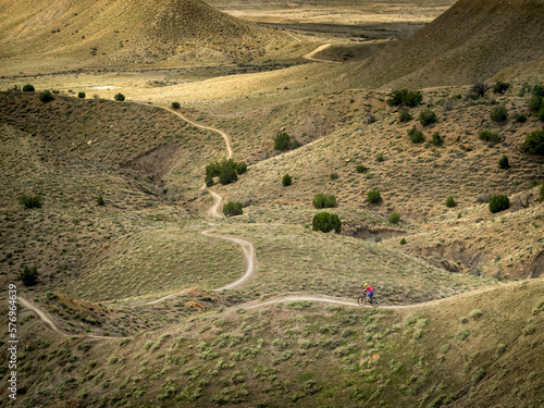 A young boy mountain biking on the 18 Road Trails near Fruita, Colorado photo