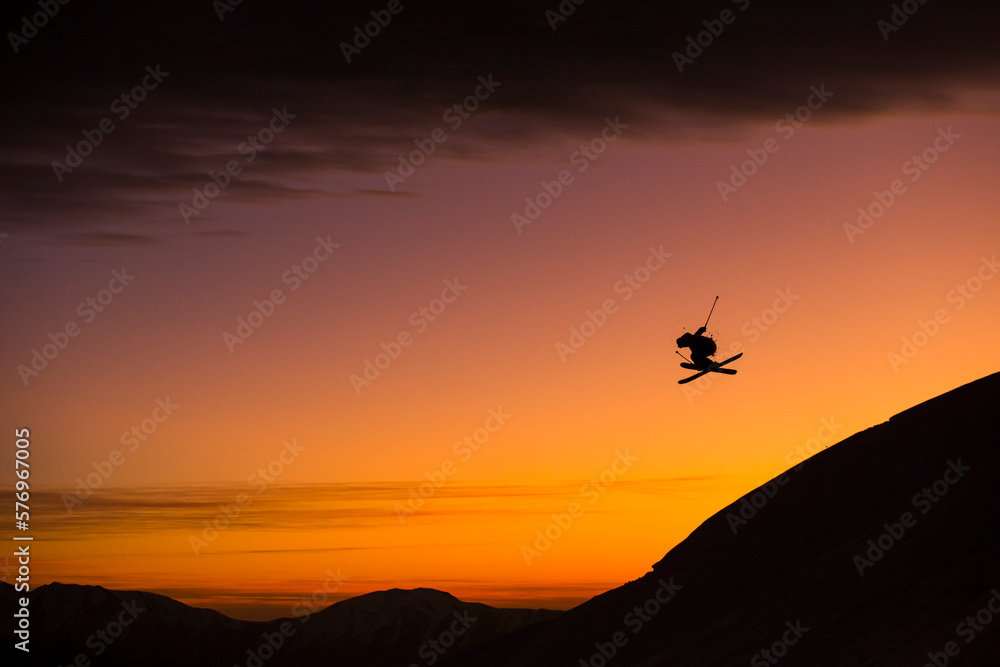 Drew Tabke Performing A Jump While Skiing Drew Tabke Performing A Jump While Skiing
