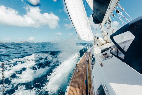 On board view of a boat sailing in rough seas in the Caribbean