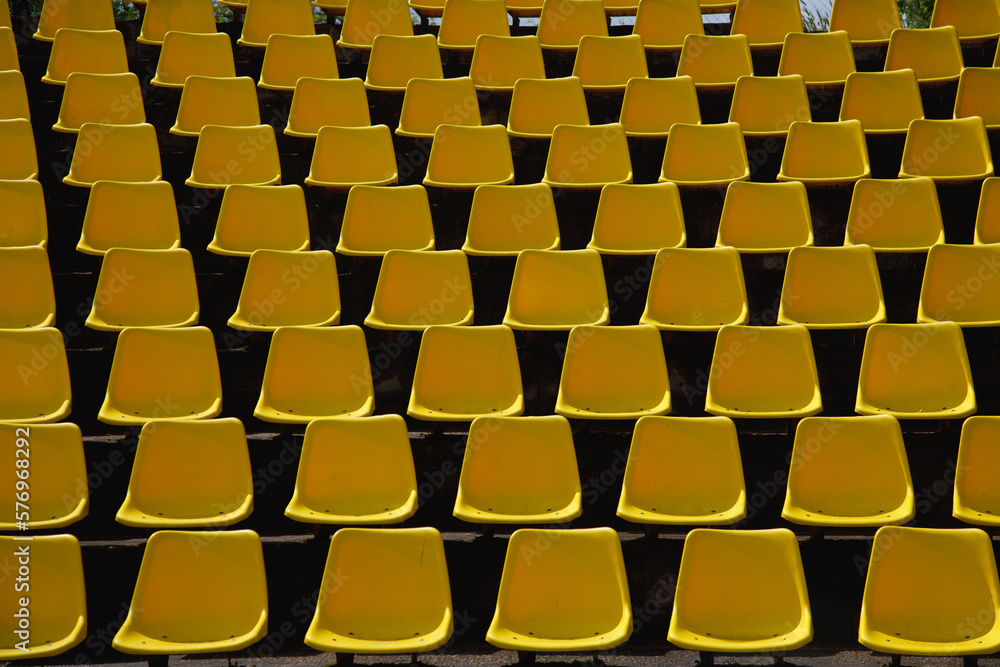Fototapeta premium yellow chairs in stadium