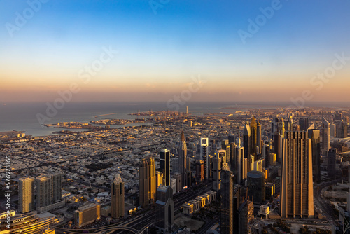 city skyline at sunrise of dubai from the burj khalifa © PandaFrog