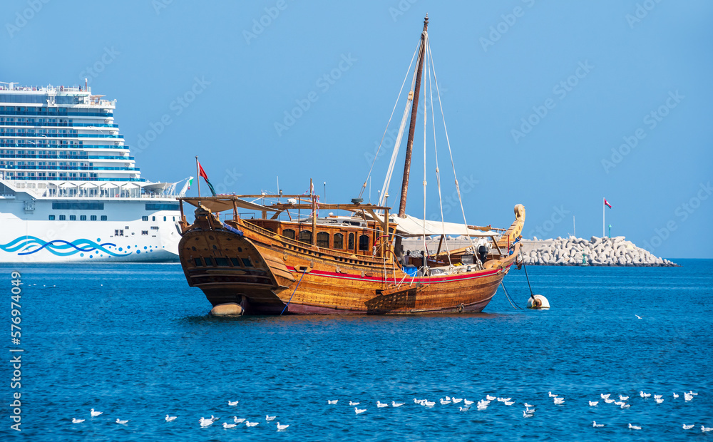 Old sailing boat anchored at the Muttrah Corniche.  Muscat, Oman

