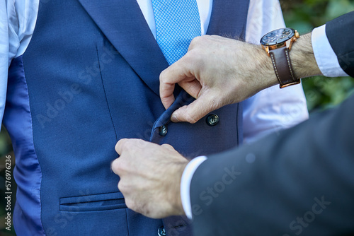 puño, manga ,camisa, hombre, gemelos, reloj, vestir, elegancia, traje, vestir, profesional, empresario, ayudar photo