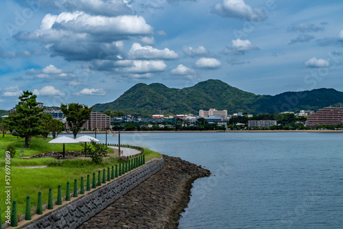 Park and residential area is beside a bay on the outskirts of Fukuoka City.