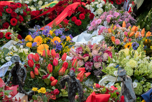 Flowers To The Dokwerker Statue At The World Two Memorial Day February Strike At Amsterdam The Netherlands 25-2-2023 photo