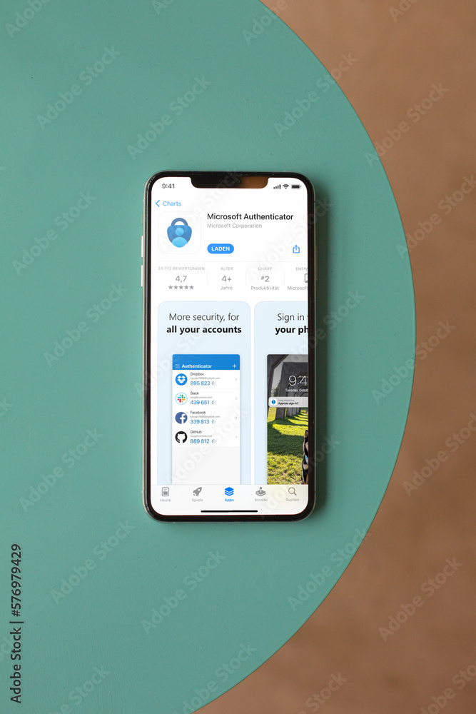 Mobile phone with Microsoft Authenticator App Store screen Stock Photo