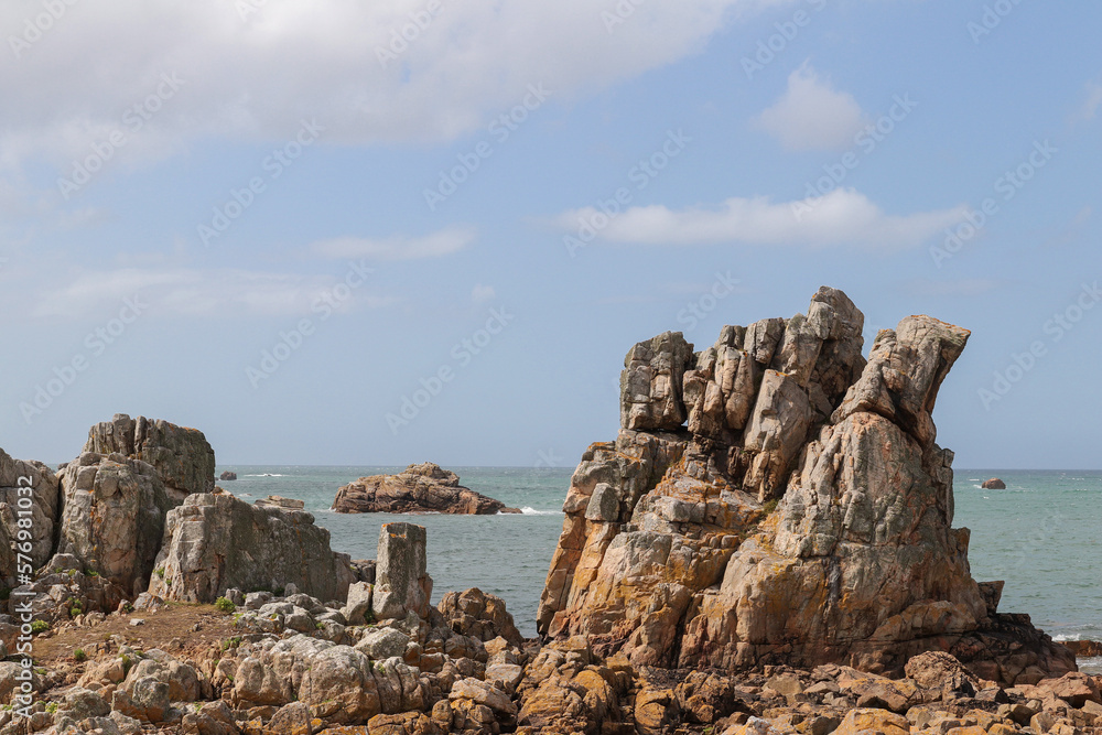Rocky cliffs on the Pink Granite Coast near Le Gouffre in Brittany