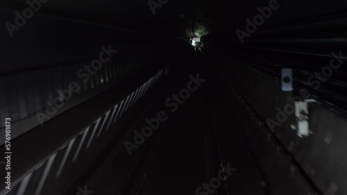 Dark tunnel view of the metro line number 4 arriving to Bikas Park Metro stop, Kelety Kelenfold photo