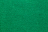 The Dark green velvet texture background. Green velvet fabric