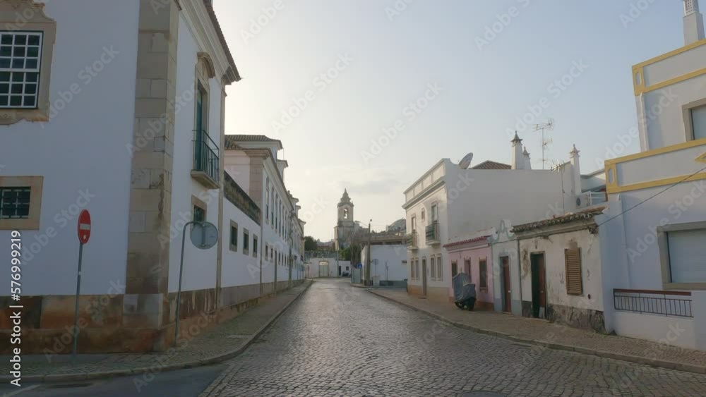 Late evening sunshine on a street Tavira algarve Portugal