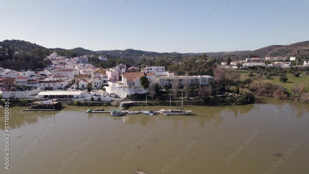 Waterfront and view of Castle of Alcoutim, Portugal; drone trucking Waterfront and view of Castle of Alcoutim, Portugal; drone trucking