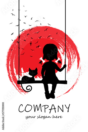 A little girl sits on a swing with a cat against the backdrop of the setting sun.