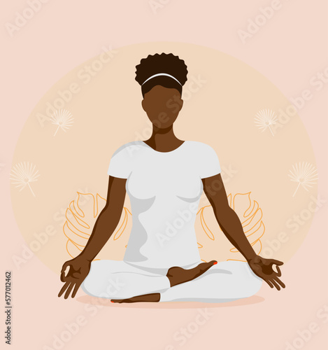 Dark girl in lotus position in faceless style.Yoga.